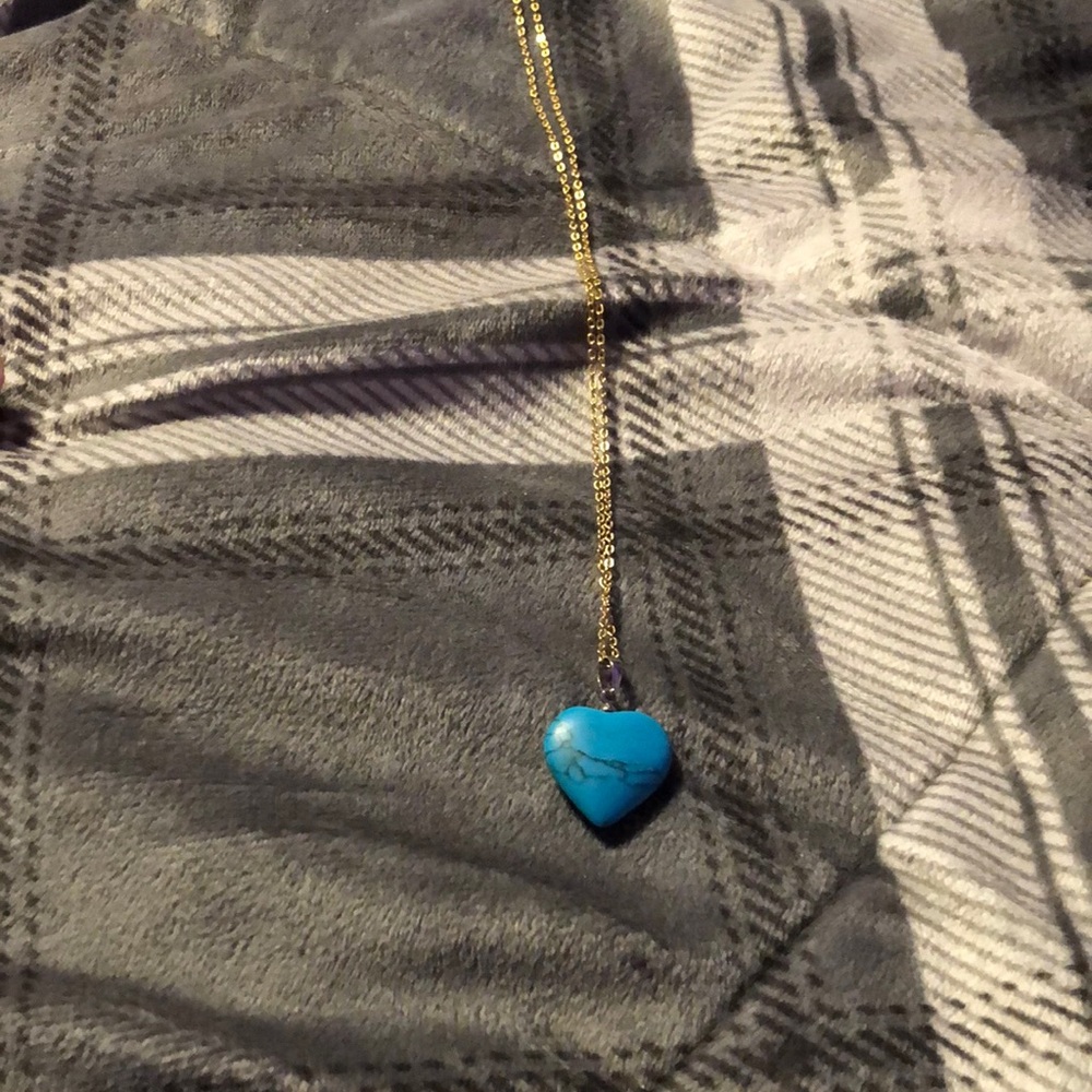 Good and blue stone shaped like a heart